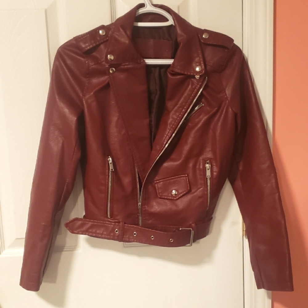 Red jacket, never been used, size S.